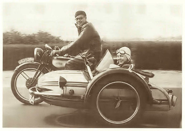 Charles and Sophia Burki and their Norton with sidecar