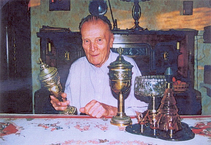 Gottlieb Tuzar with a few trophys from his racing period