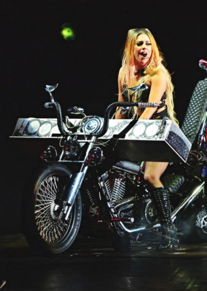 Lady Gaga playing her "pianomotorcycle"