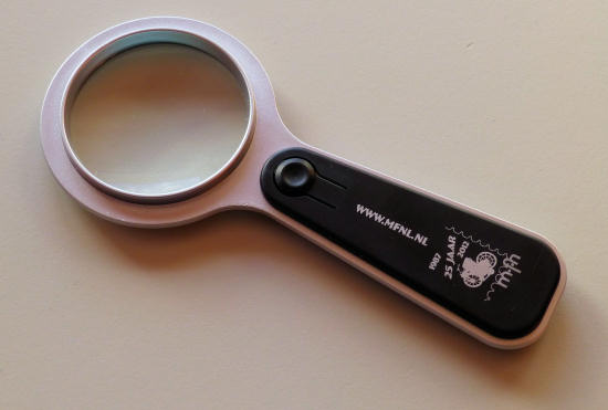 Jubilee present: magnifying glass with imprint 25 year MFN
